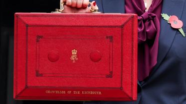 Britain's Chancellor of the Exchequer Rachel Reeves poses with the red budget box outside her office on Downing Street in London, Britain October 30, 2024. Photo: REUTERS