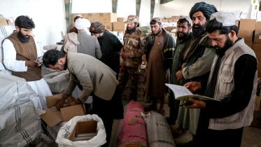 taliban_evaluating_books.jpg