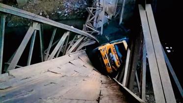 Truck falls into Turag river after collapse of Bailey bridge