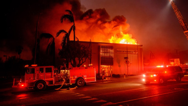 afp_20250109_36tc6h9_v1_preview_usweatherfire.jpg
