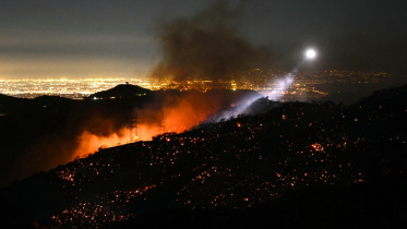 afp_20250112_36tk9dd_v2_preview_topshotusweatherfire.jpg