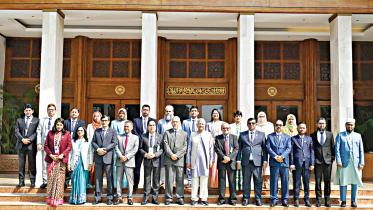 Chief Adviser Prof Muhammad Yunus with a group of DCs