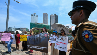 afp_20250403_38x66u2_v1_highres_srilankaindiadiplomacyprotest.jpg