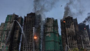 afp_20251127_86cw6nr_v1_midres_hongkongchinafire.jpg