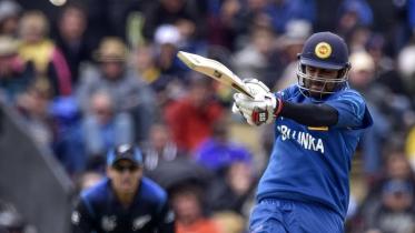 Sri Lankan batter Lahiru Thirimanne plays a shot 