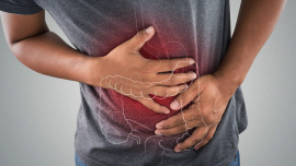 person-in-pain-holding-stomach.png