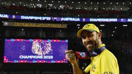 Australia's Glenn Maxwell celebrates with his medal after winning the ICC Cricket World Cup.