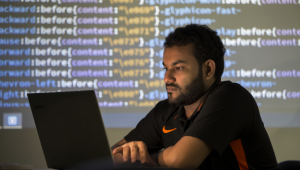 Picture of a person who is coding