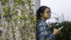 Young person listening to music