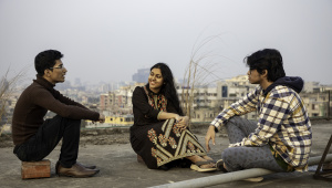 Three people talking 