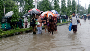 People looking for shelter in the flood, photo taken in Akhalia area of Sylhet