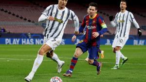 Messi and Ronaldo playing against each other. 