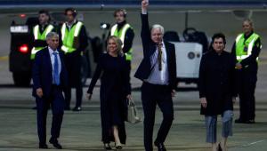 WikiLeaks founder Julian Assange gestures as he arrives in Canberra, Australia, June 26, 2024. REUTERS/Edgar Su
