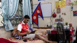 International medical student studying in his room