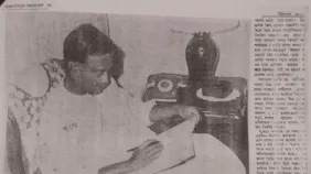 Ziaur Rahman writing his diary.jpg